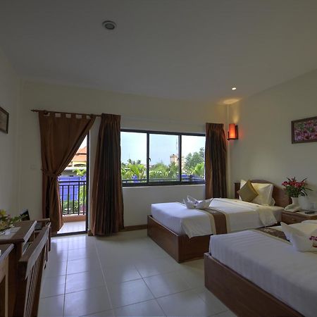 Kouprey Hotel Ciudad de Siem Riep Habitación foto